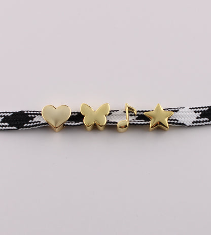 Gold emoji sneaker charms heart butterfly music note and star on black checkered shoelace