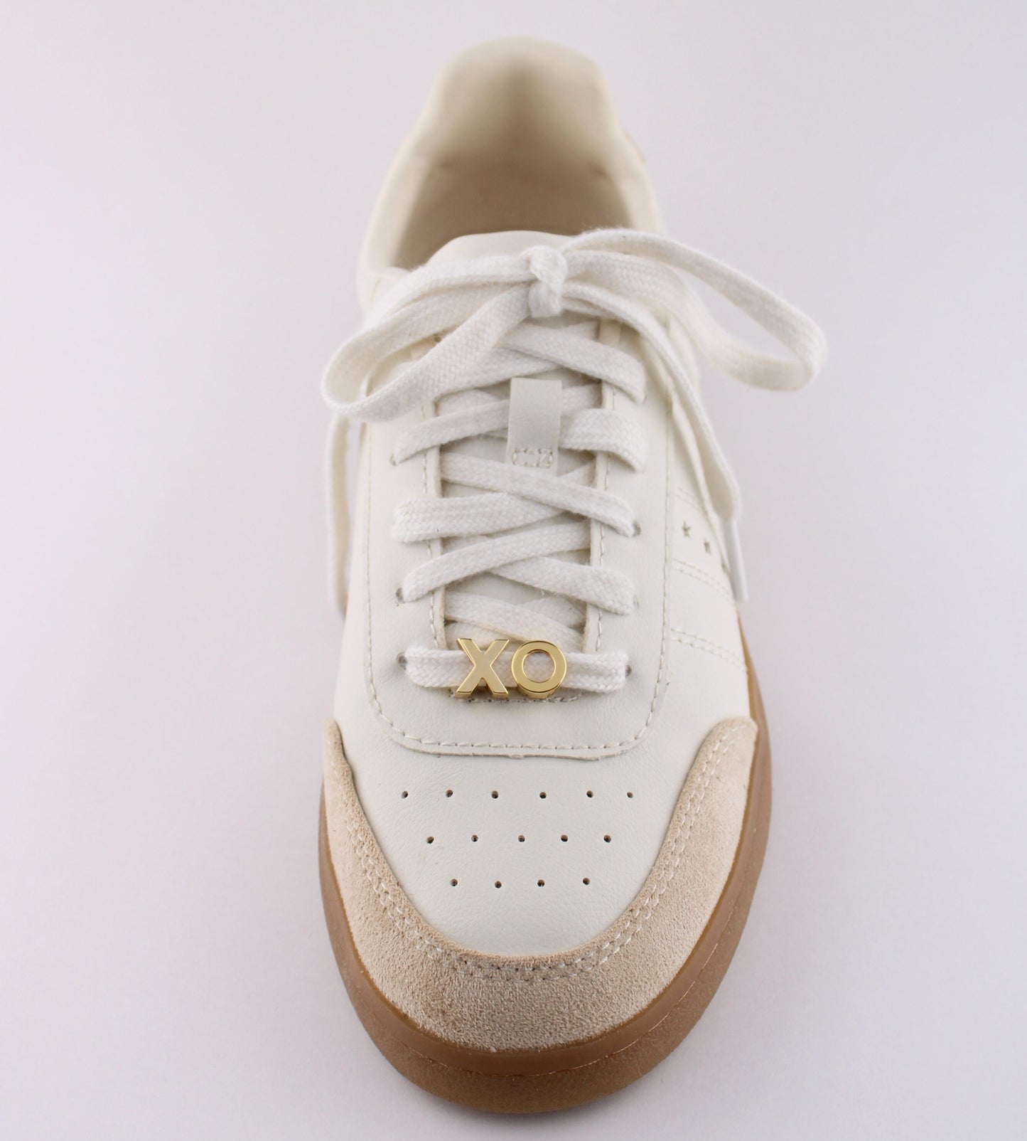 White sneaker with gold XO letter charm on shoelace - personalized XO sneaker charm for shoelaces